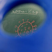 Corona-Virus written on a board