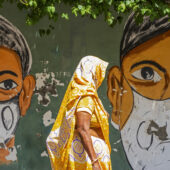 Mural in New Delhi raising awareness about wearing facemasks
