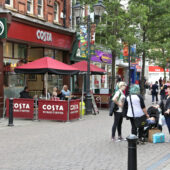 S square with people and The Body Shop and Costa