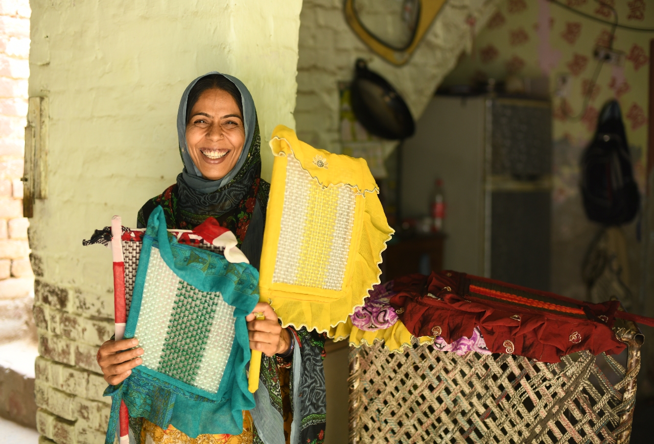 Woman fans developing country Pakistan